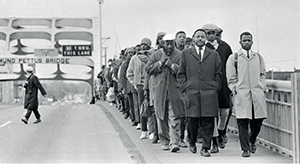 March 1965, John was brutally attacked as he and other civil rights leaders crossed the Edmund Pettus Bridge. (Credit:  Alabama Department of Archives and History)