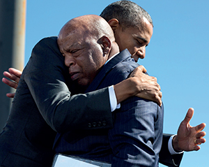 President Barack Obama hugs John Lewis, after his introduction during the event to commemorate the 50th Anniversary of Bloody Sunday and the Selma to Montgomery civil rights marches, at the Edmund Pettus Bridge 2015. (Credit: White House Photo by Pete Souza)